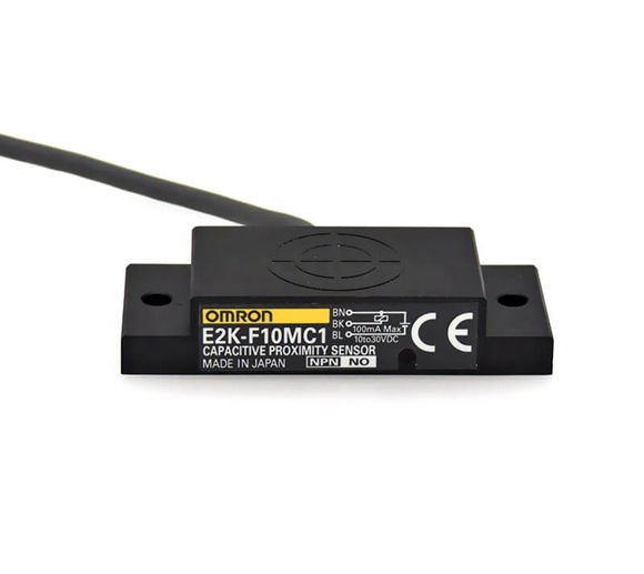 E2K-F10MB1  E2KF10MB1 OMRON 50X10,1X20MM 12-24VDC BESLEMELİ PNP NO 10MM ALGILAMALI KAPASİTİF SENSÖR